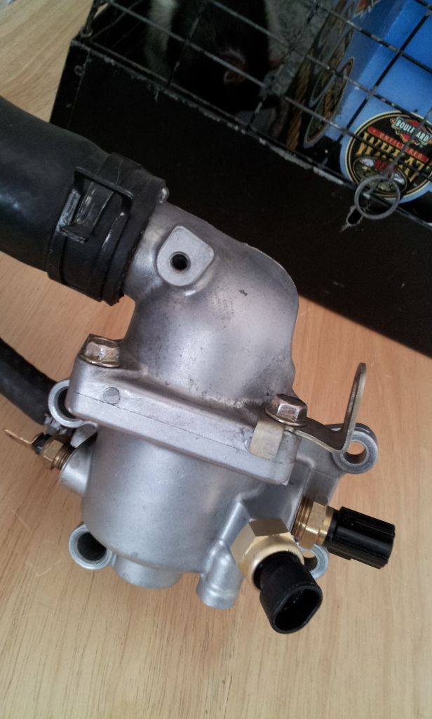 Tapping Evo9 thermostat housing for an additional 1/8" NPT coolant temp